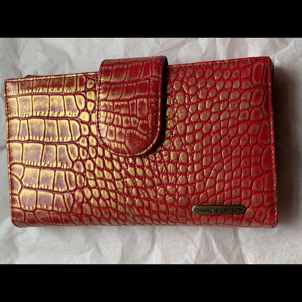 Charlie Lapson. Red wallet.